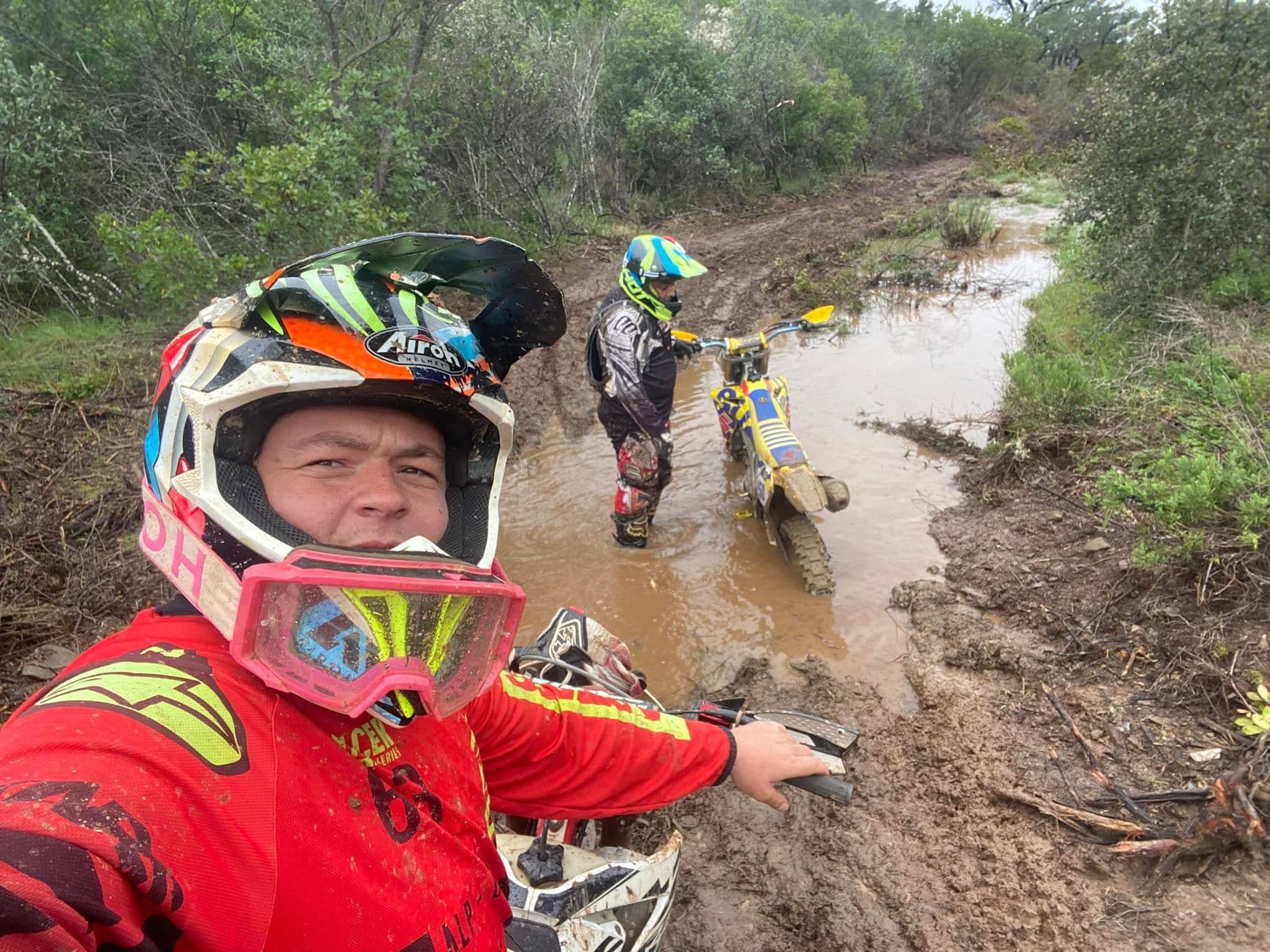 Enduro Algarve guides in riding gear standing with motorcycles
